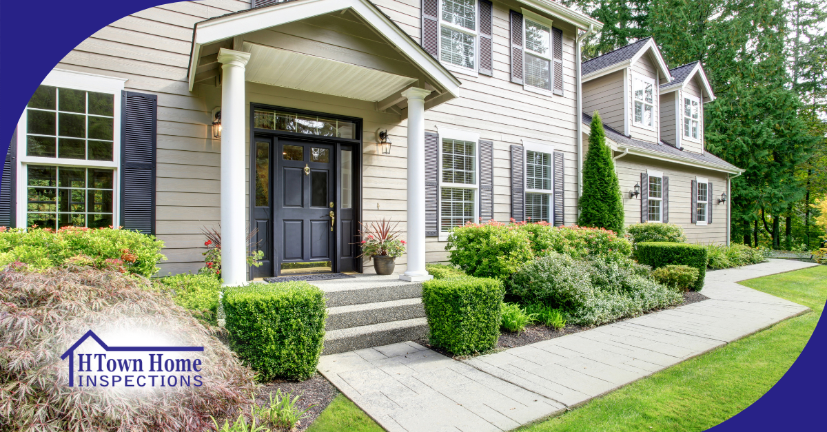 Elegant home with neatly trimmed shrubs and a welcoming entrance