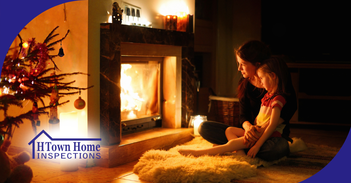 Mother and child sitting by a cozy fireplace during winter.