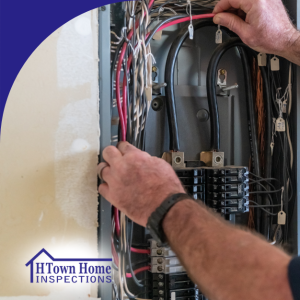 Home inspector evaluating an electrical breaker panel during an inspection.